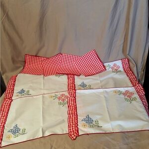 Hand made cross stitched place mats (4) and napkins(4) spring flowers